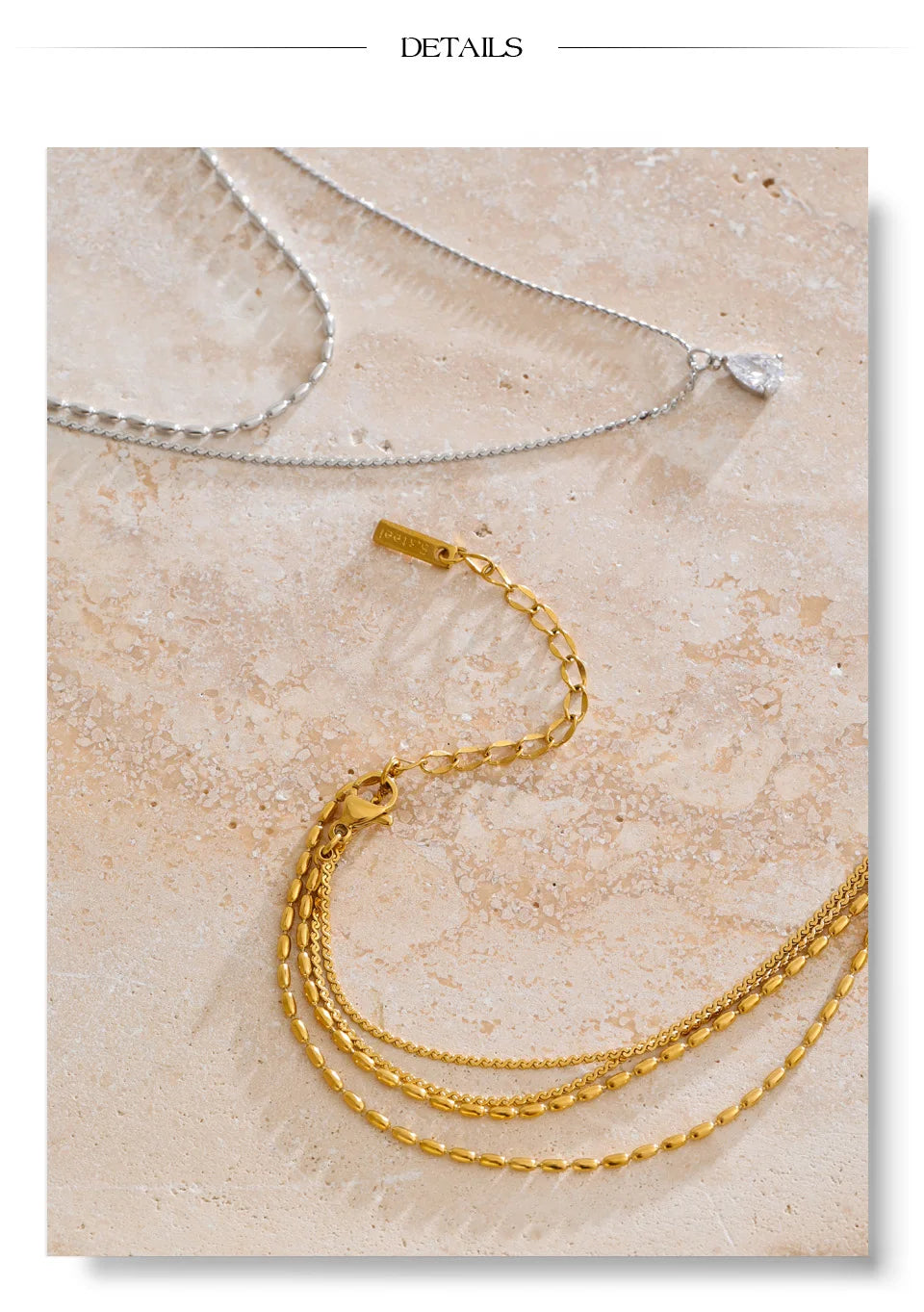 Cubic zirconia geometric layered necklace in gold-plated stainless steel with cubic zirconia.