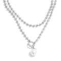 Pearl beaded geometric necklace in gold-plated stainless steel with pearl.