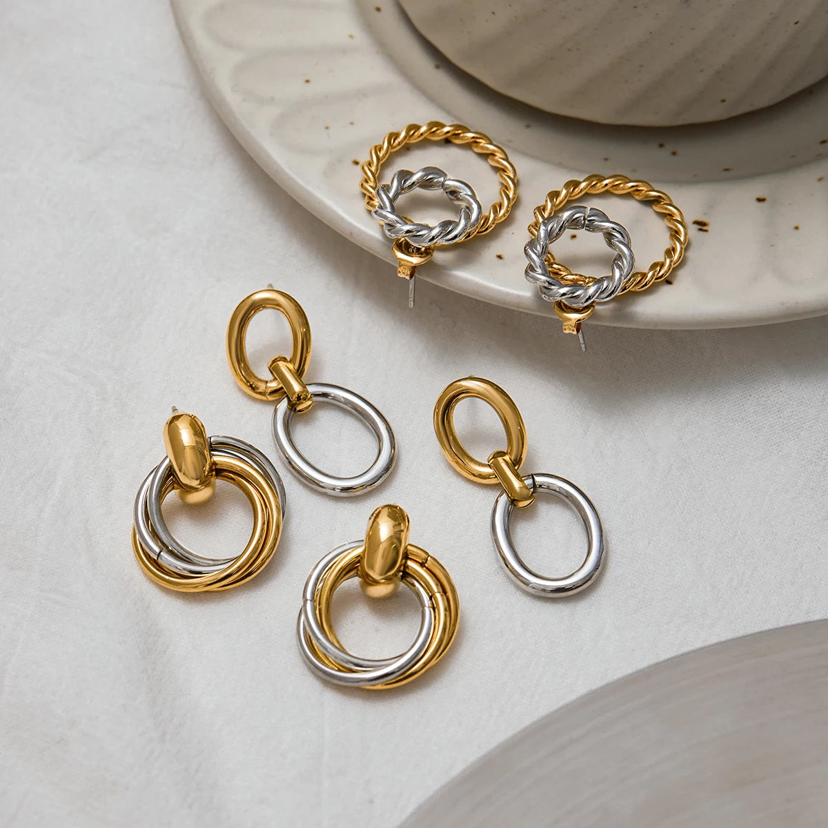 Two-Tone Knot Hoop Earrings — Stainless Steel · PS102