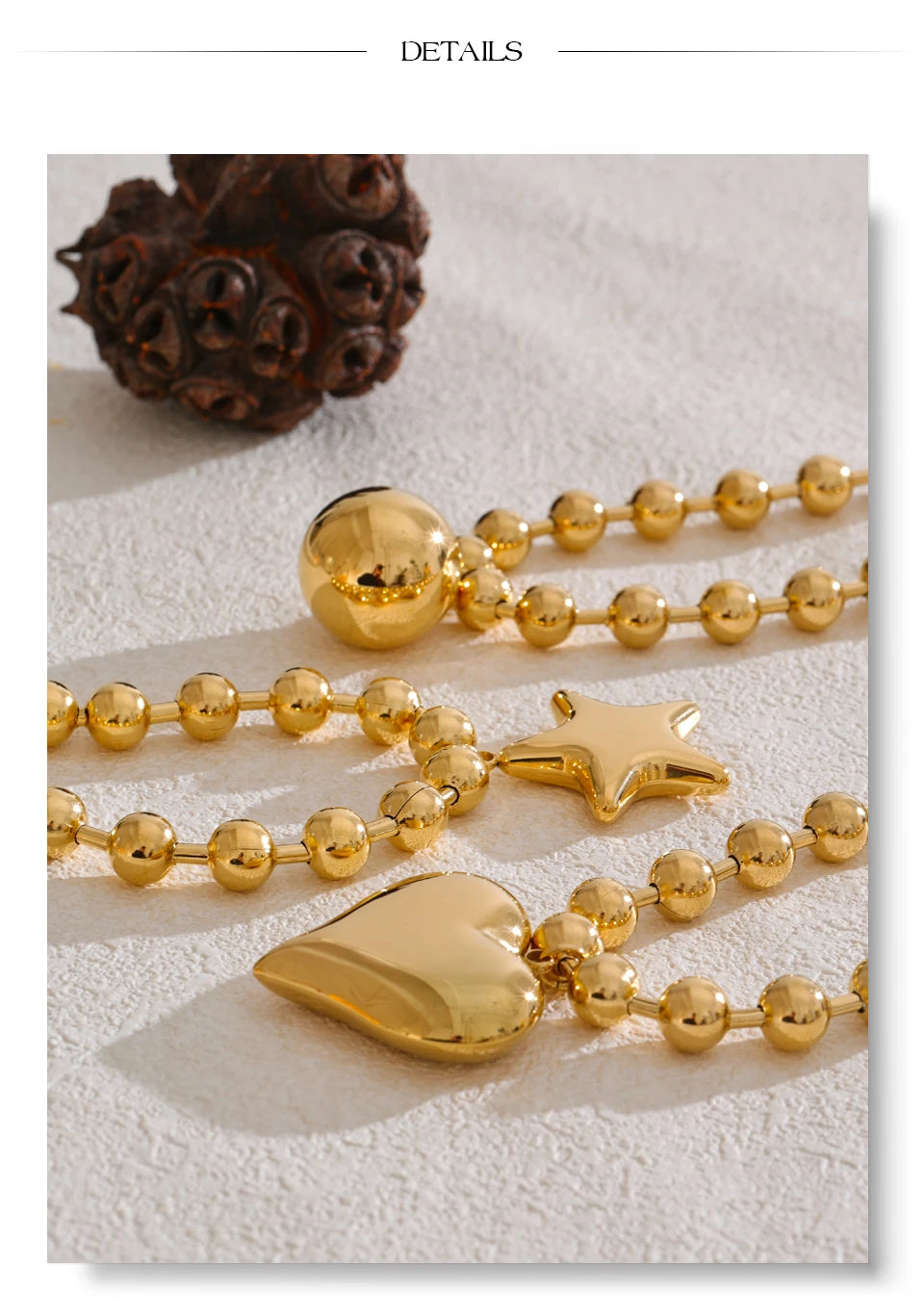 Heart star beaded necklace in gold-plated stainless steel.