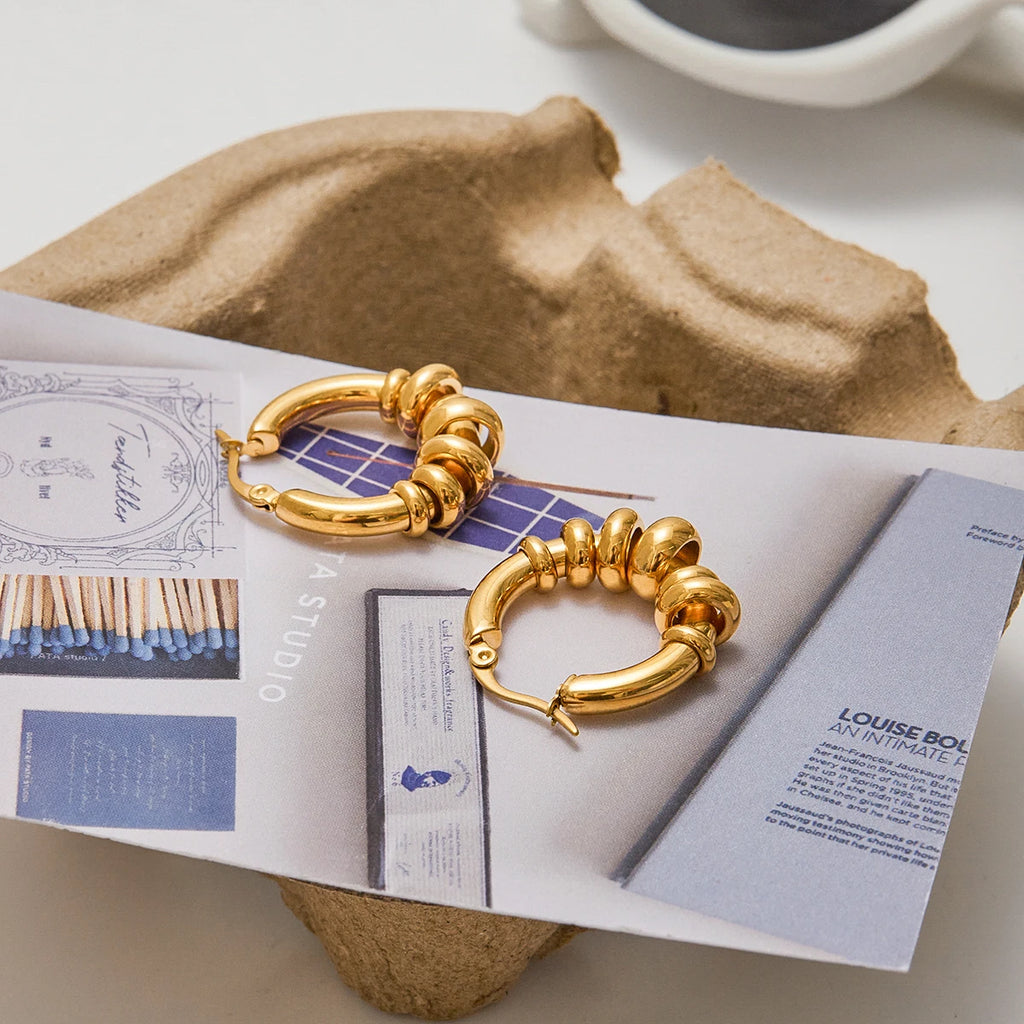 Twisted Hoop Earrings — Stainless Steel · PS089
