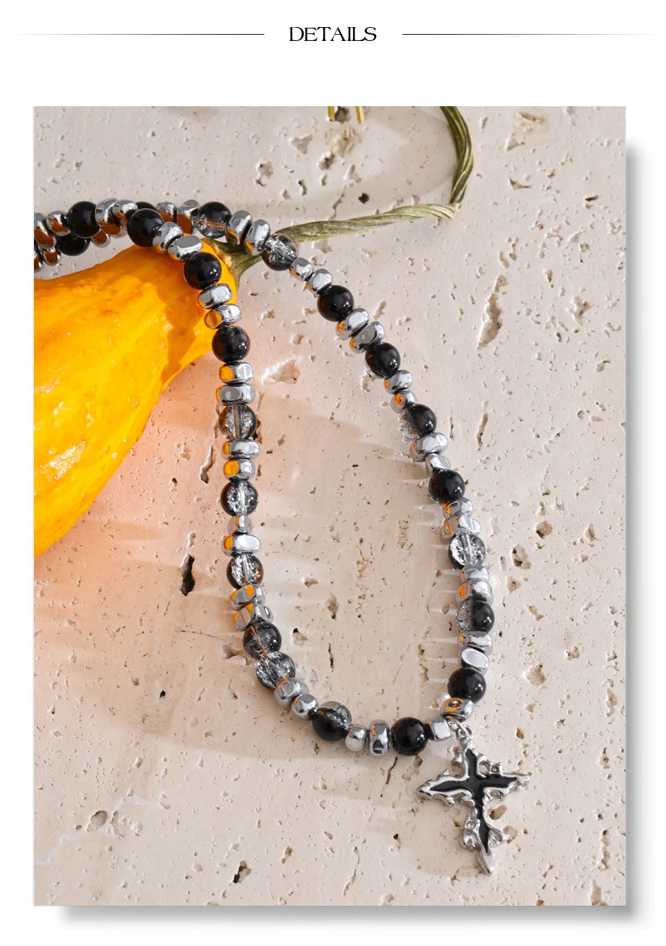 Natural stone cross beaded necklace in gold-plated stainless steel with natural stone.