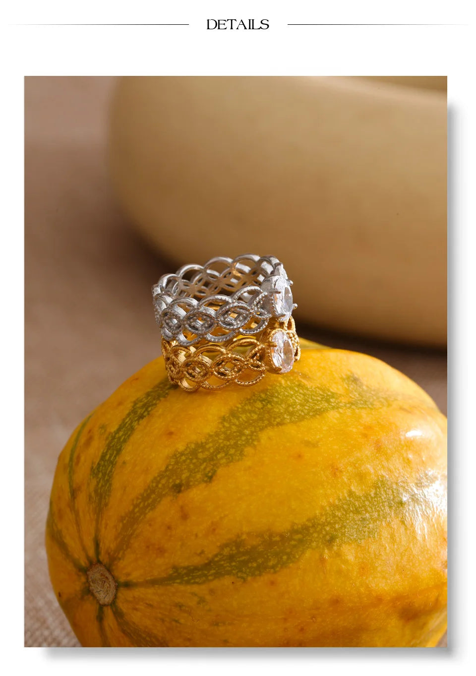 Cubic zirconia geometric ring in 18K gold-plated stainless steel with cubic zirconia.