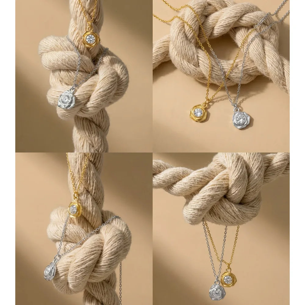 Cubic zirconia flower necklace in gold-plated stainless steel with cubic zirconia.