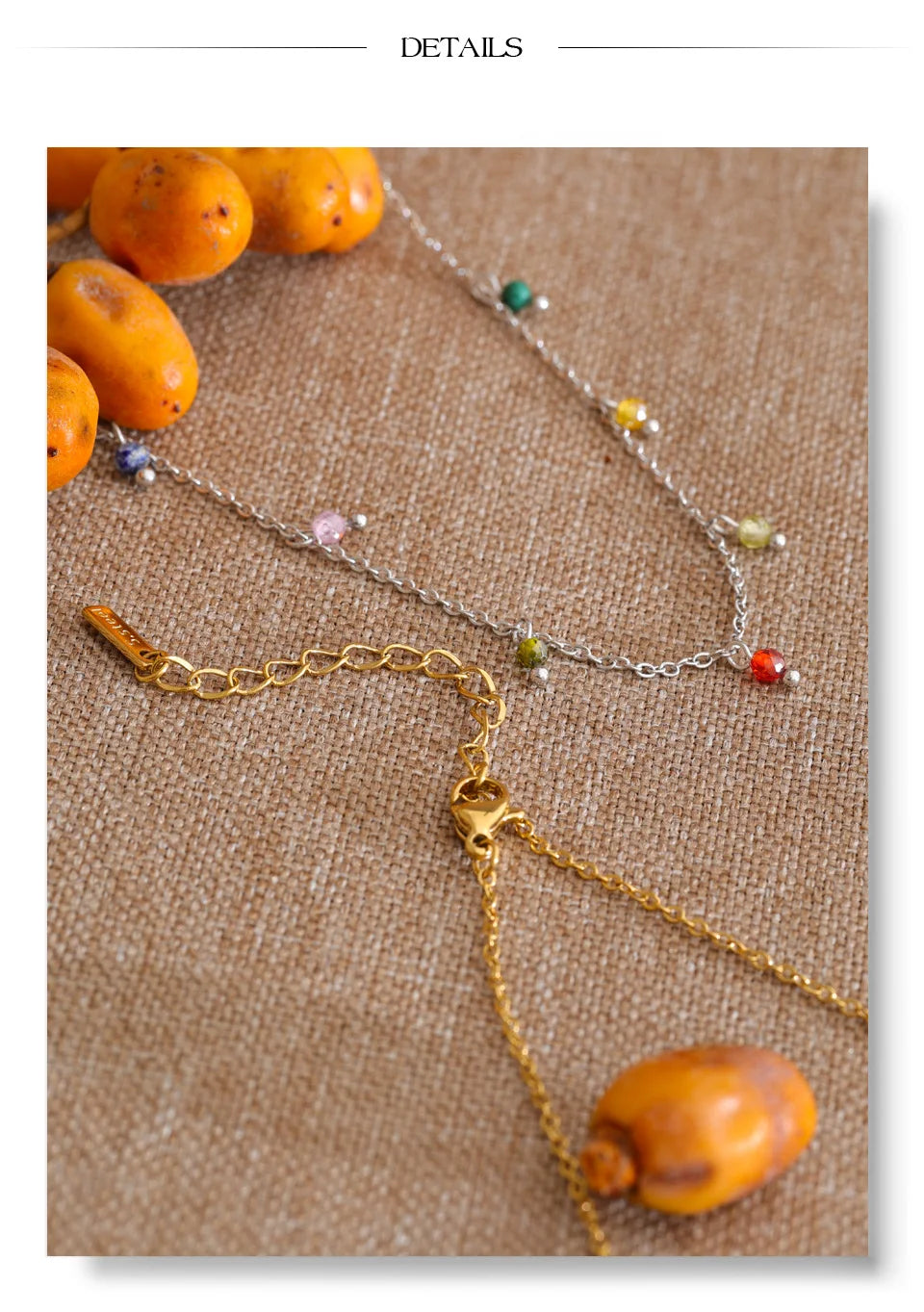 Cubic zirconia multi-color geometric necklace in gold-plated stainless steel with cubic zirconia.
