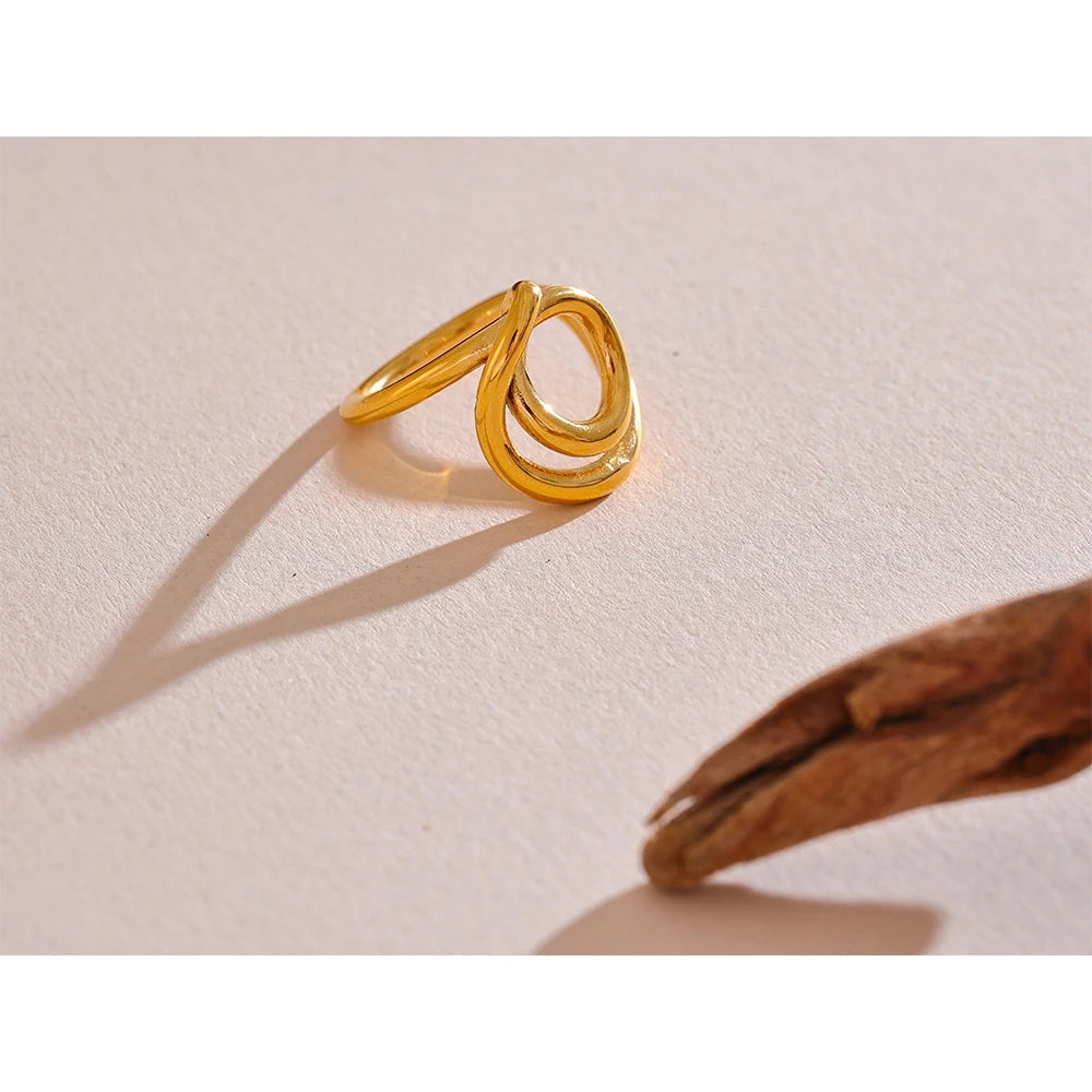 Geometric ring in 18K gold-plated 316L stainless steel.