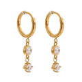 Cubic zirconia geometric earrings in gold-plated stainless steel with cubic zirconia.