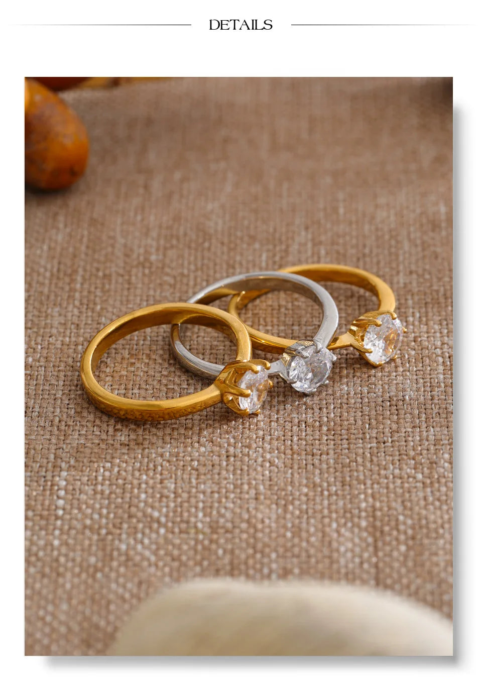 Cubic zirconia geometric ring in 18K gold-plated stainless steel with cubic zirconia.