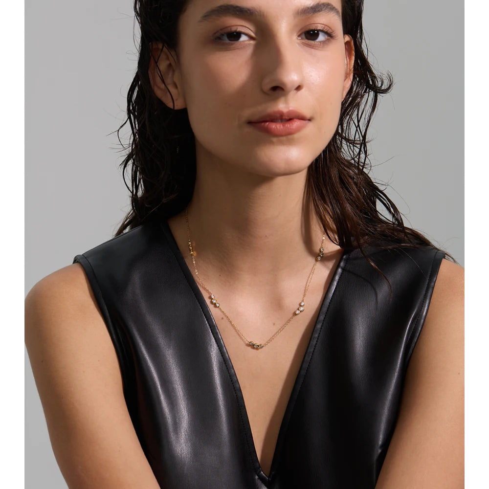 Cubic zirconia geometric chain necklace in gold-plated stainless steel with cubic zirconia.