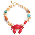Red shell resin necklace in gold-plated stainless steel with natural stone and shell.