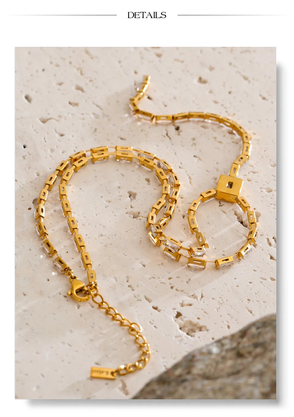 Cubic zirconia geometric chain necklace in gold-plated stainless steel with cubic zirconia.