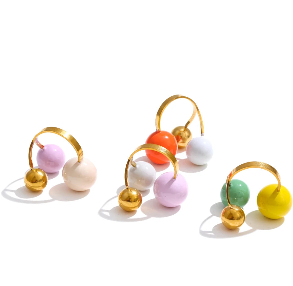 Enamel multi-color geometric ring in 18K gold-plated stainless steel with enamel.
