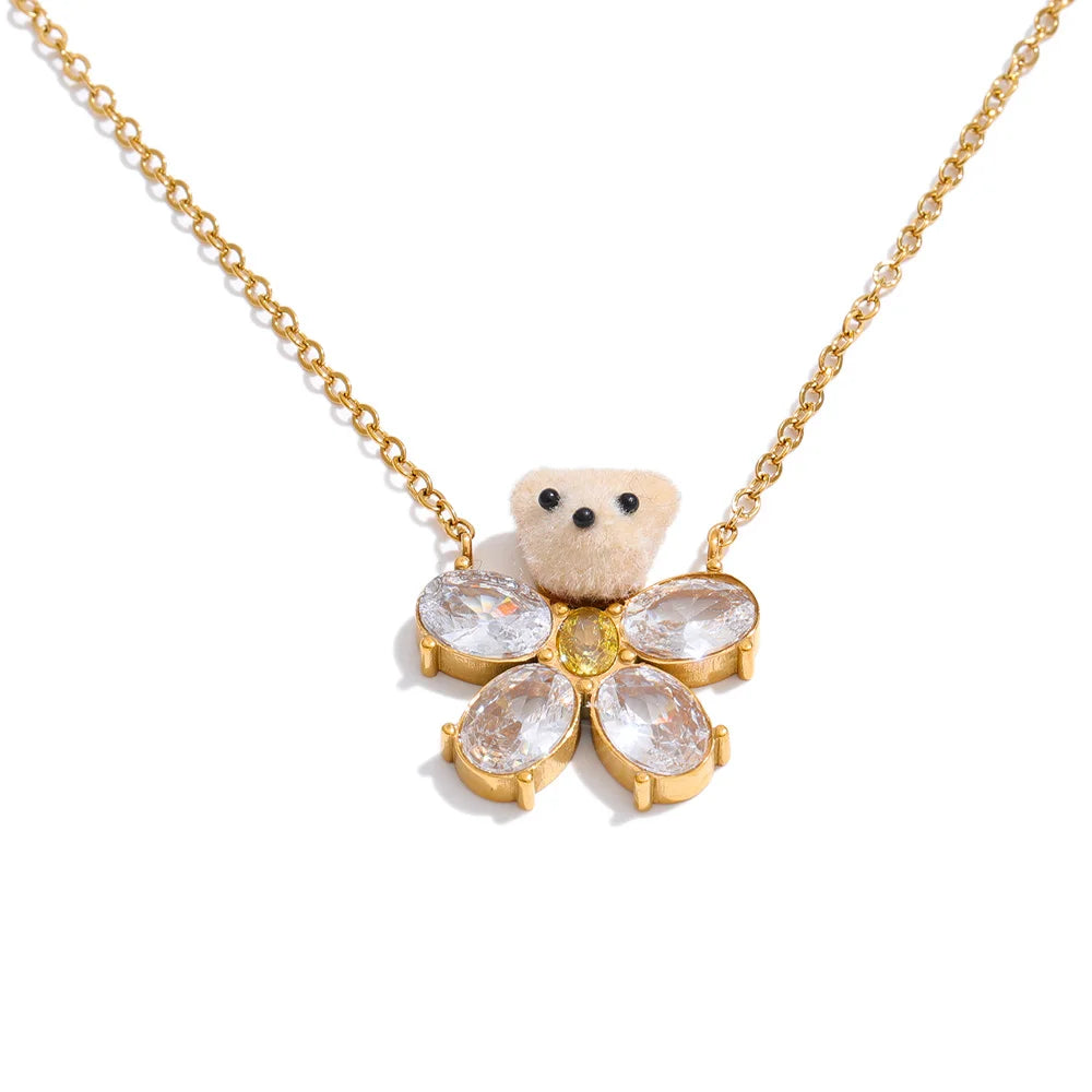 Cubic zirconia flower necklace in gold-plated stainless steel with cubic zirconia.
