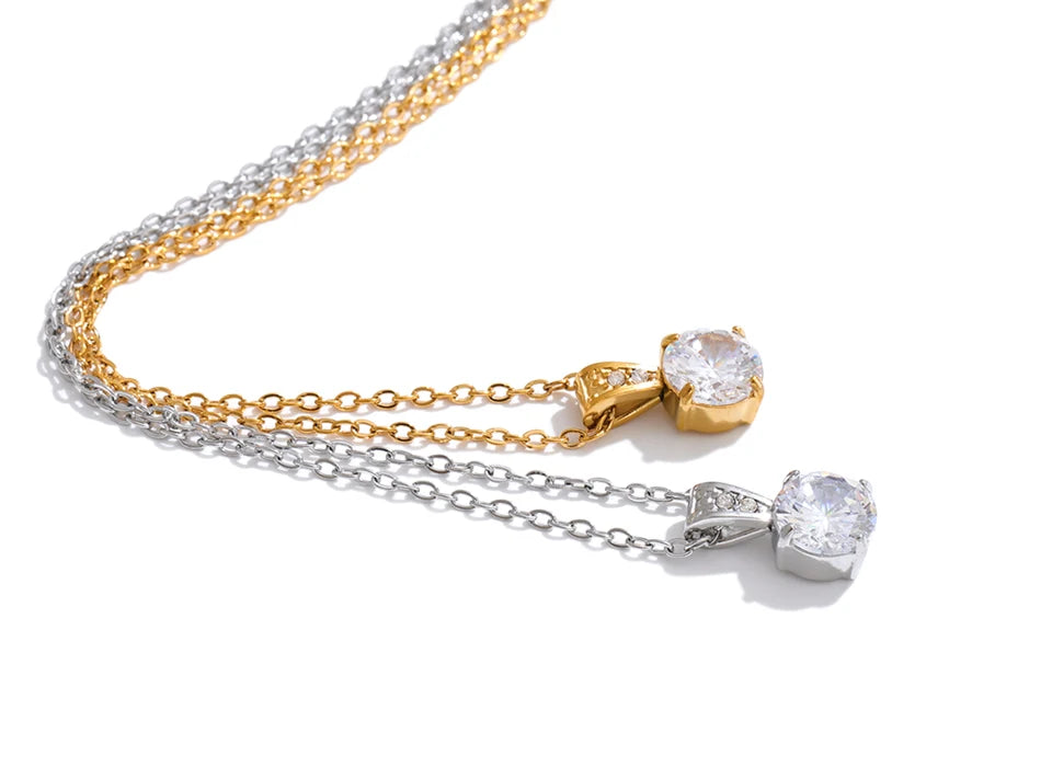 Cubic zirconia geometric necklace in gold-plated stainless steel with cubic zirconia.
