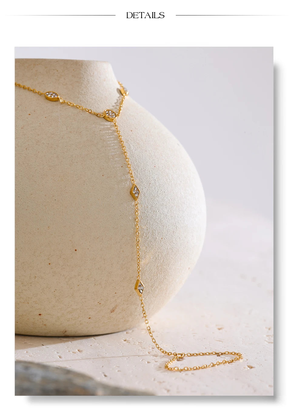 Cubic zirconia geometric chain necklace in gold-plated stainless steel with cubic zirconia.