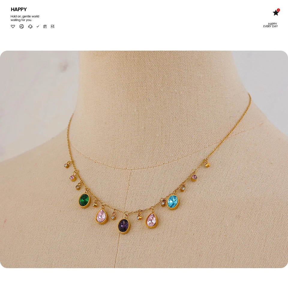 Cubic zirconia multi-color geometric necklace in gold-plated stainless steel with cubic zirconia.