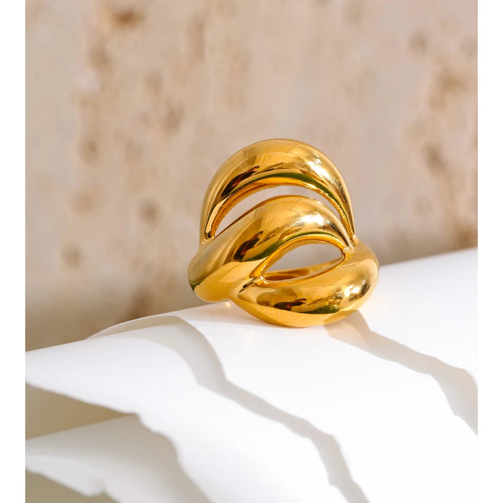 Geometric layered ring in 18K gold-plated stainless steel.
