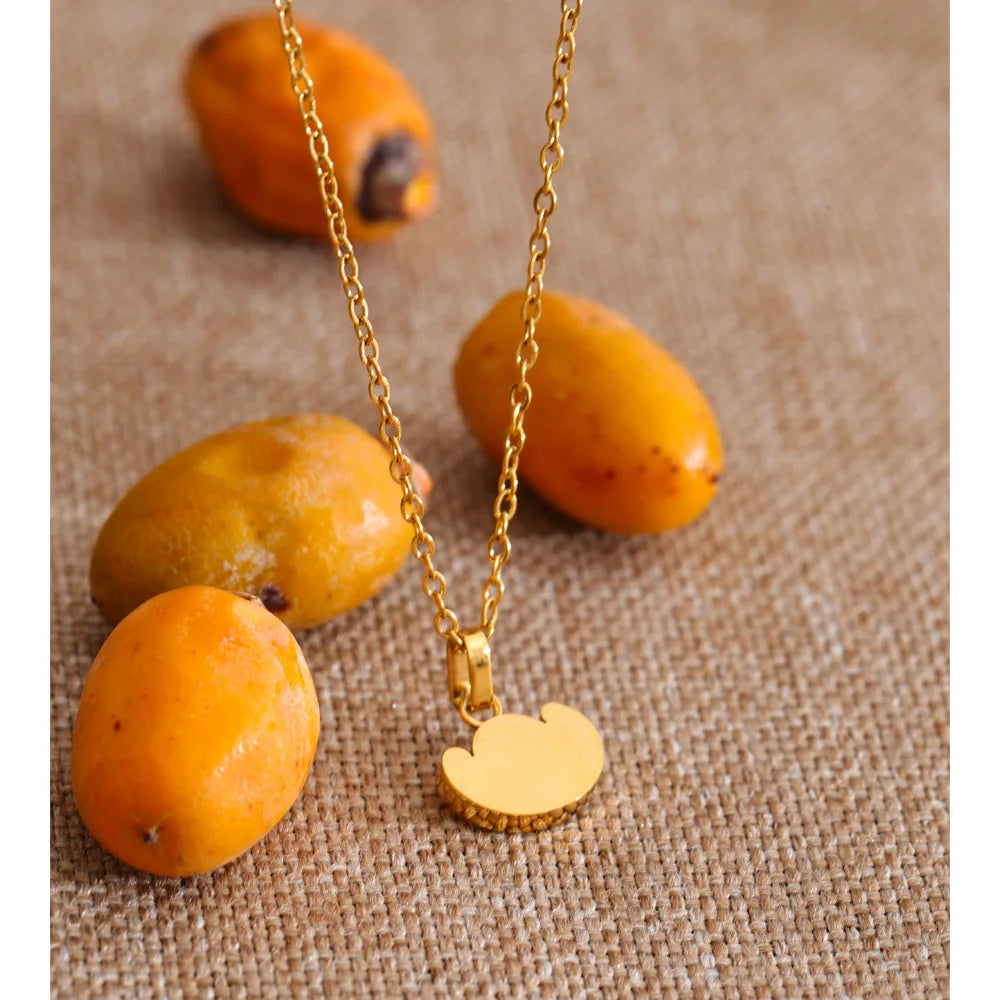 Geometric necklace in gold-plated stainless steel.