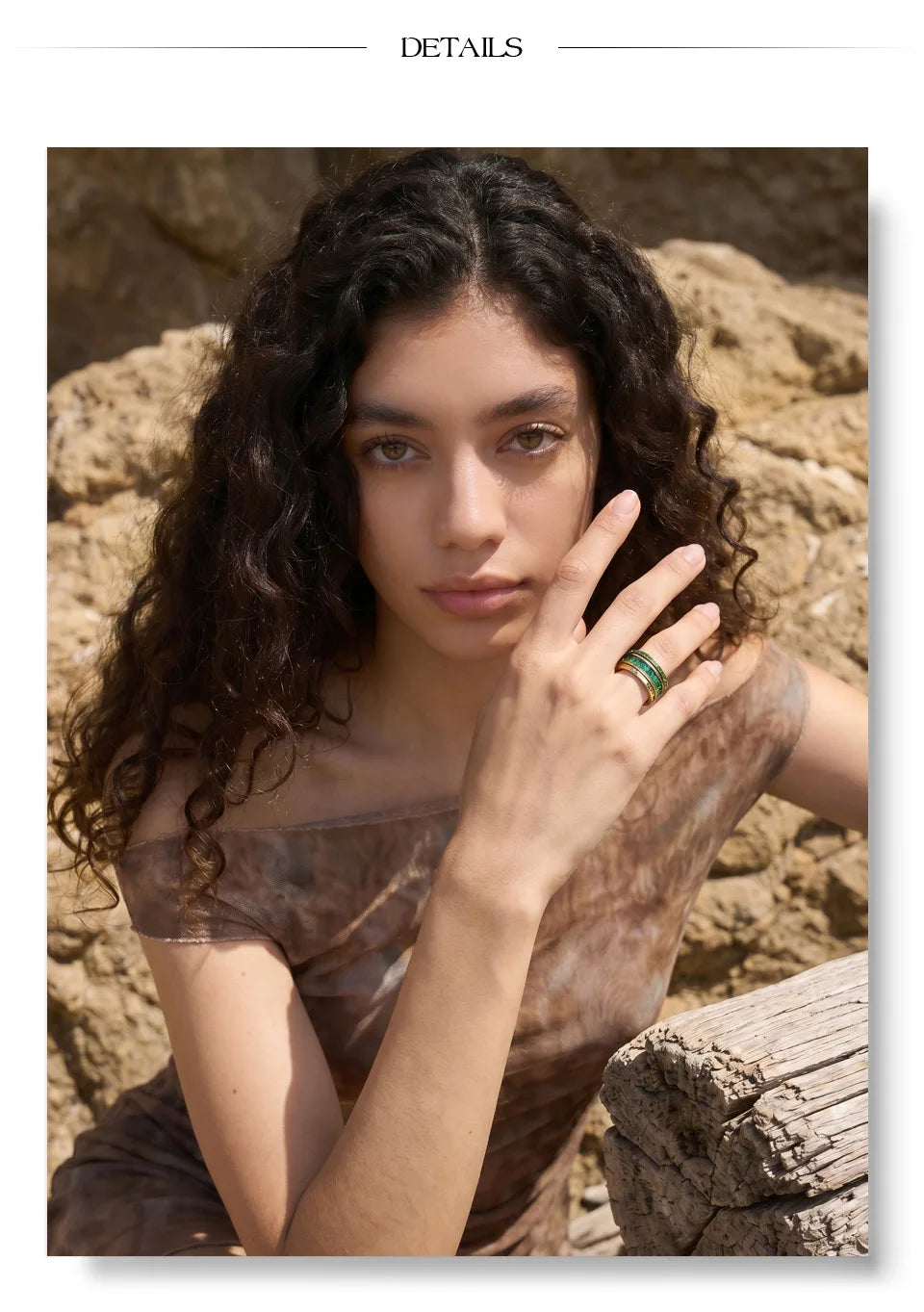 Cubic zirconia geometric layered ring in 18K gold-plated stainless steel with cubic zirconia.
