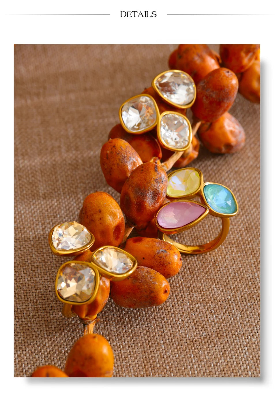 Crystal multi-color geometric ring in 18K gold-plated stainless steel with crystal.