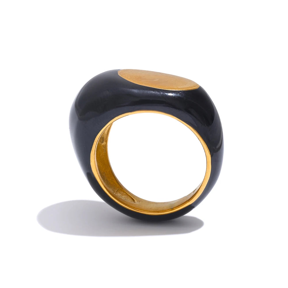 Black enamel geometric ring in gold-plated 316L stainless steel with enamel.