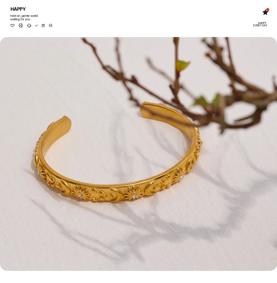 Star moon sun bracelet in gold-plated stainless steel.