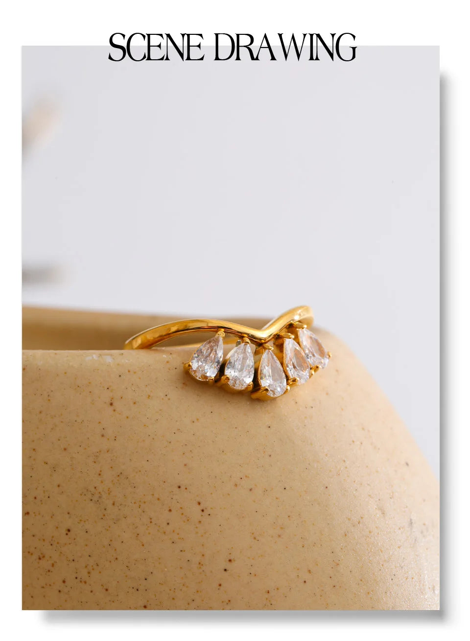 Cubic zirconia flower geometric ring in 18K gold-plated stainless steel with cubic zirconia.