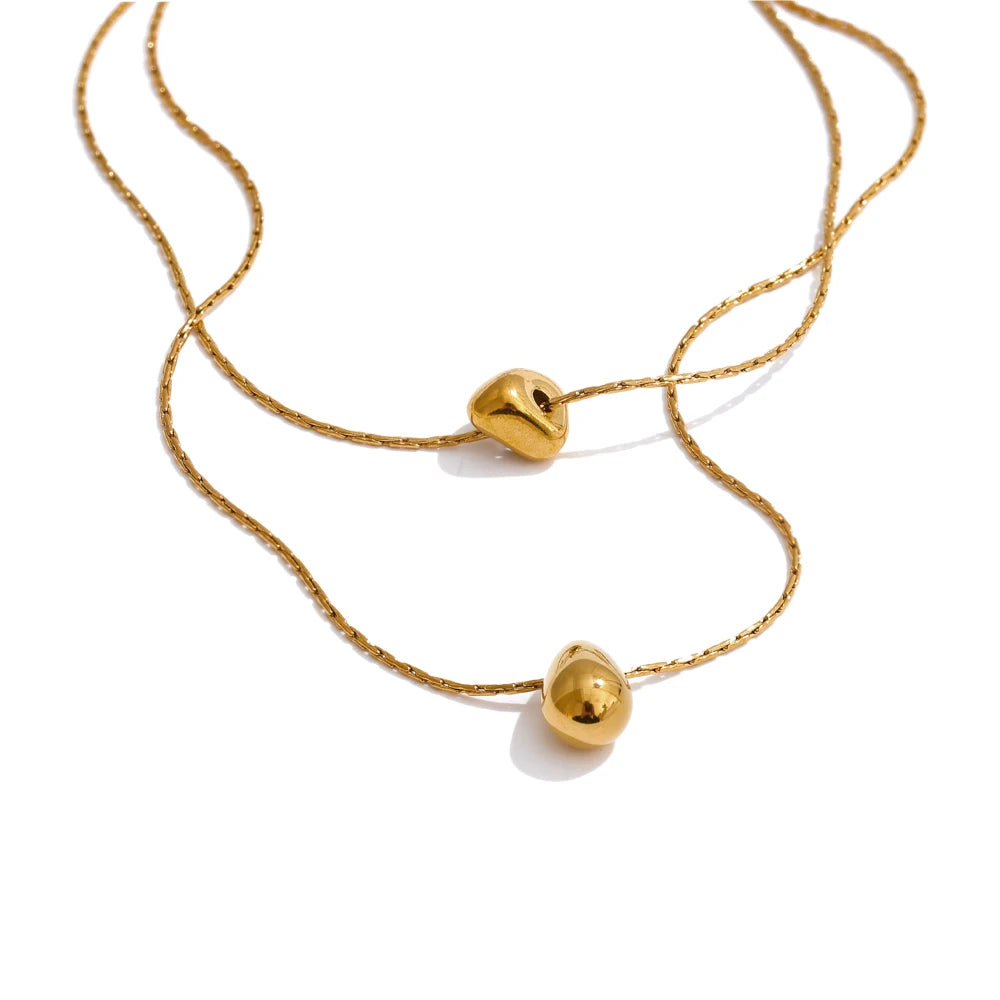 Chain layered necklace in gold-plated stainless steel.