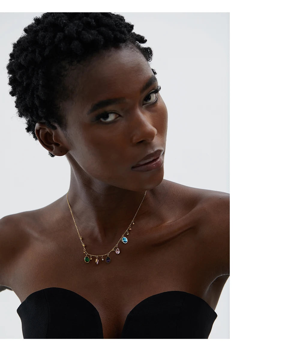 Cubic zirconia multi-color geometric necklace in gold-plated stainless steel with cubic zirconia.
