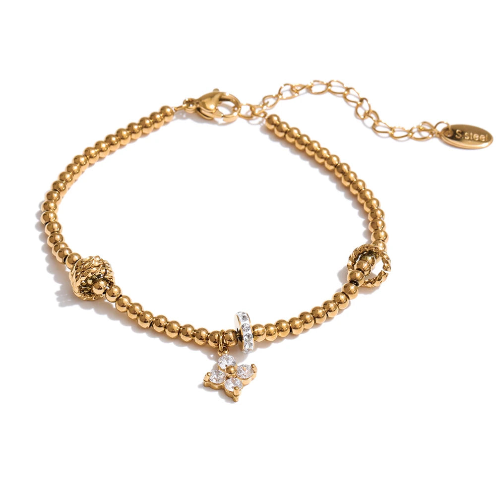 Cubic Zirconia Flower Beaded Bracelet — Gold-Plated Stainless Steel with Cubic Zirconia · PS1066