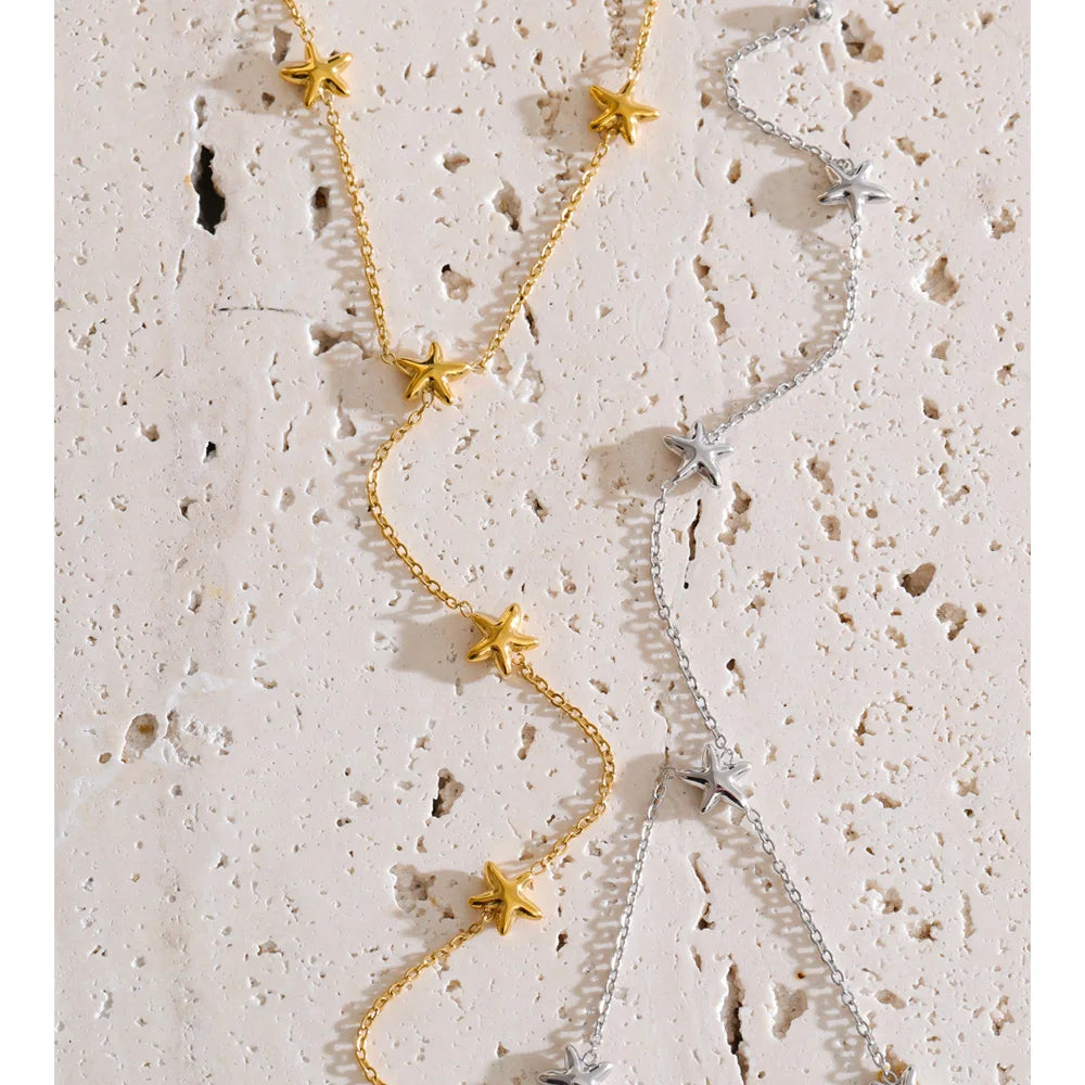 Star chain necklace in gold-plated stainless steel.