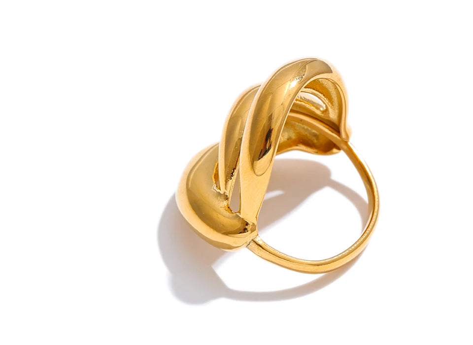 Geometric layered ring in 18K gold-plated stainless steel.