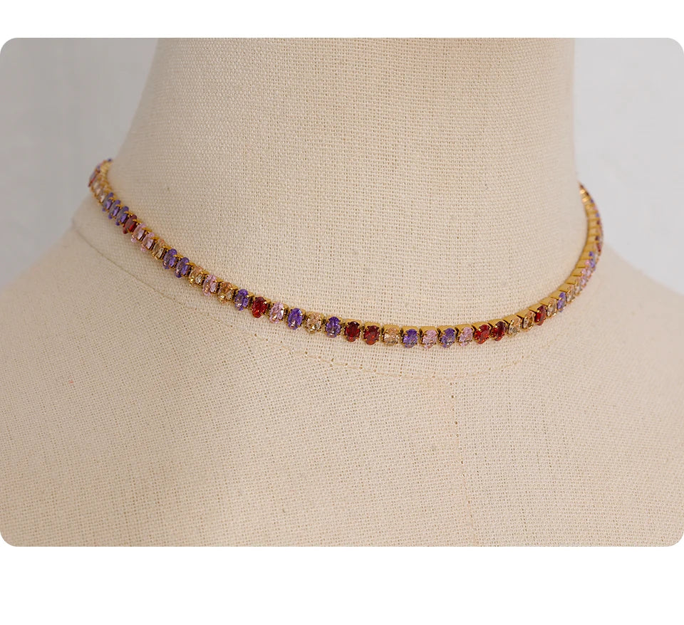 Cubic zirconia geometric necklace in gold-plated stainless steel with cubic zirconia.
