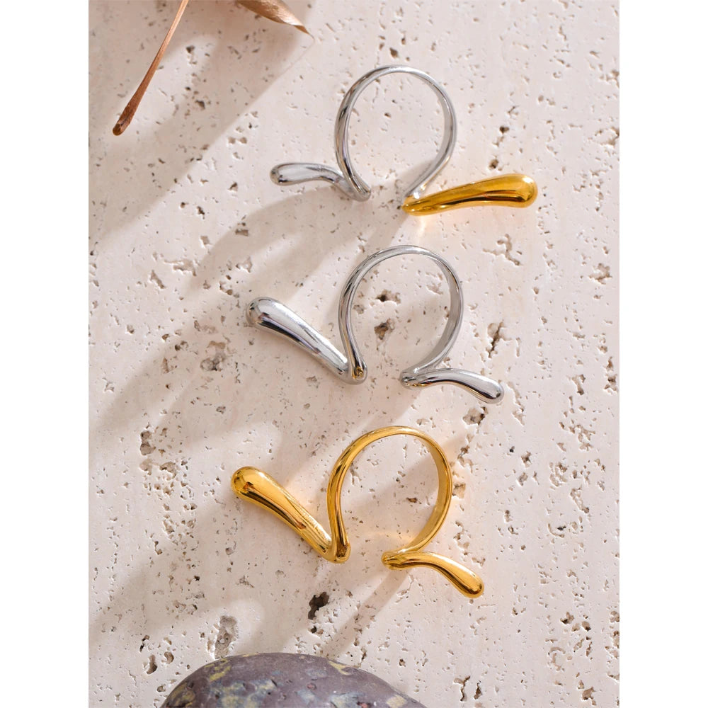 Geometric ring in 18K gold-plated stainless steel.