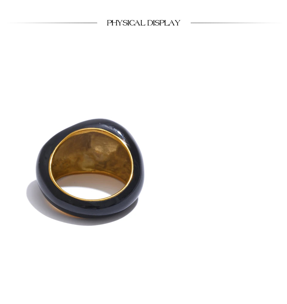 Black enamel geometric ring in gold-plated 316L stainless steel with enamel.