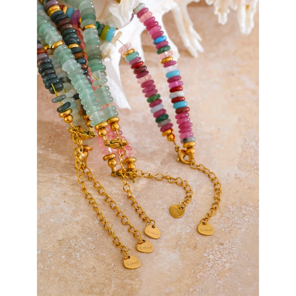 Natural stone beaded multi-color necklace in gold-plated stainless steel with natural stone.