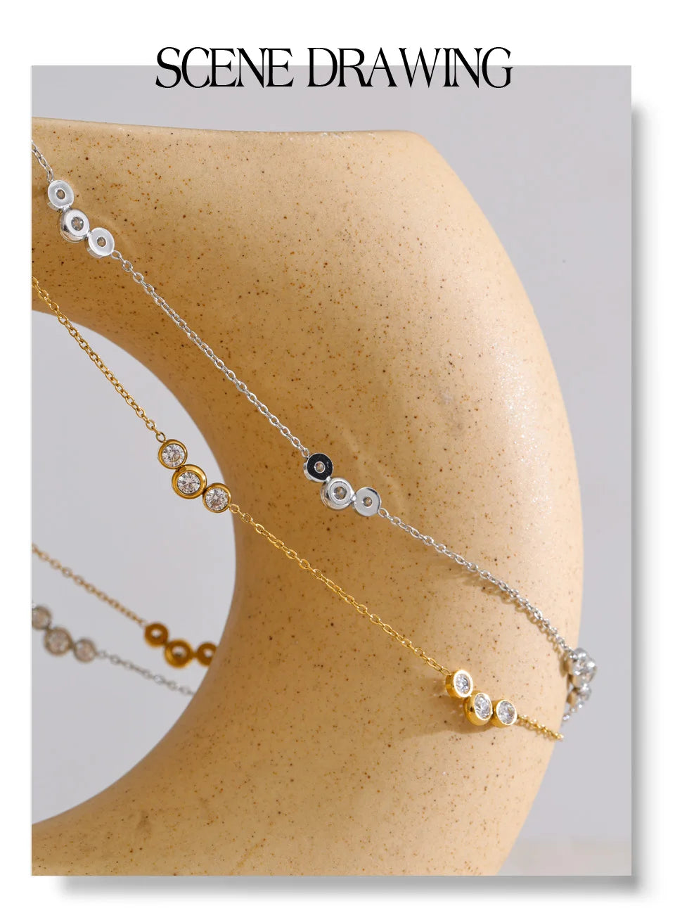 Cubic zirconia geometric chain necklace in gold-plated stainless steel with cubic zirconia.