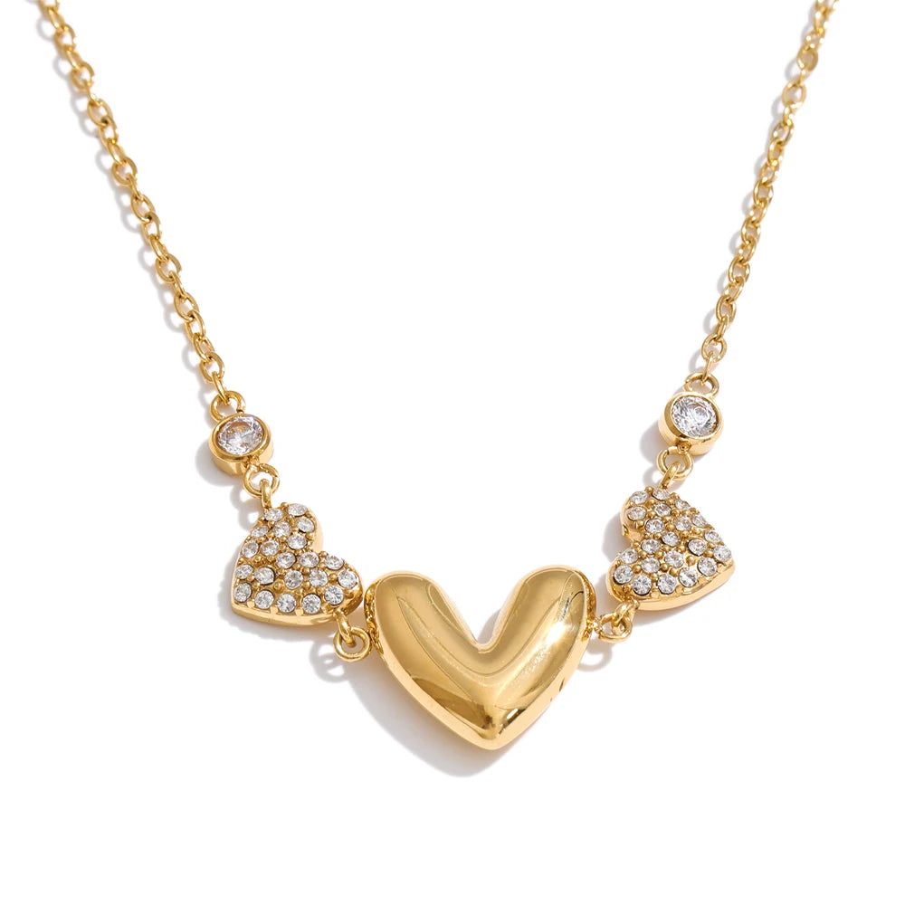 Cubic zirconia heart necklace in gold-plated stainless steel with cubic zirconia.