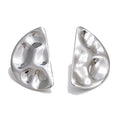 Hammered geometric earrings in gold-plated stainless steel.