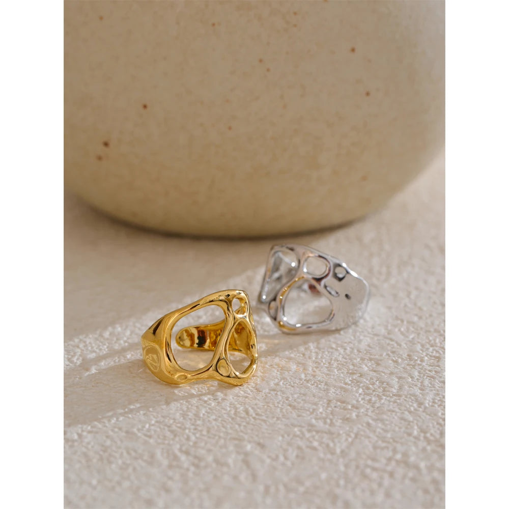 Geometric ring in gold-plated stainless steel.