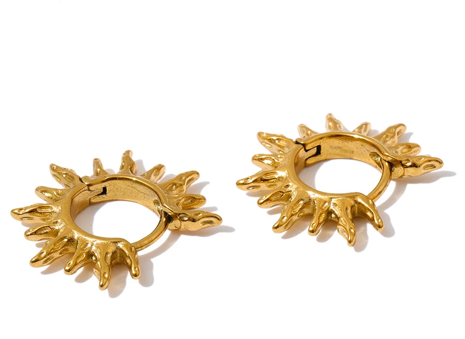 Star sun hammered earrings in gold-plated stainless steel.