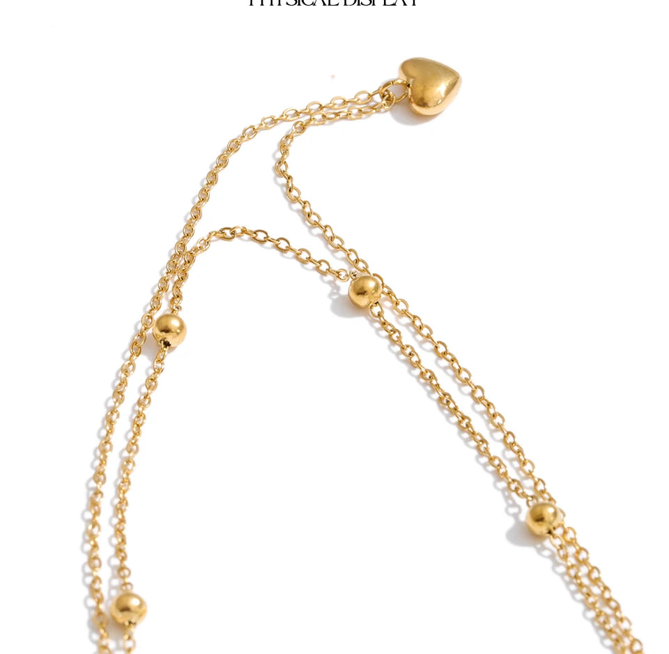 Heart chain necklace in gold-plated stainless steel.