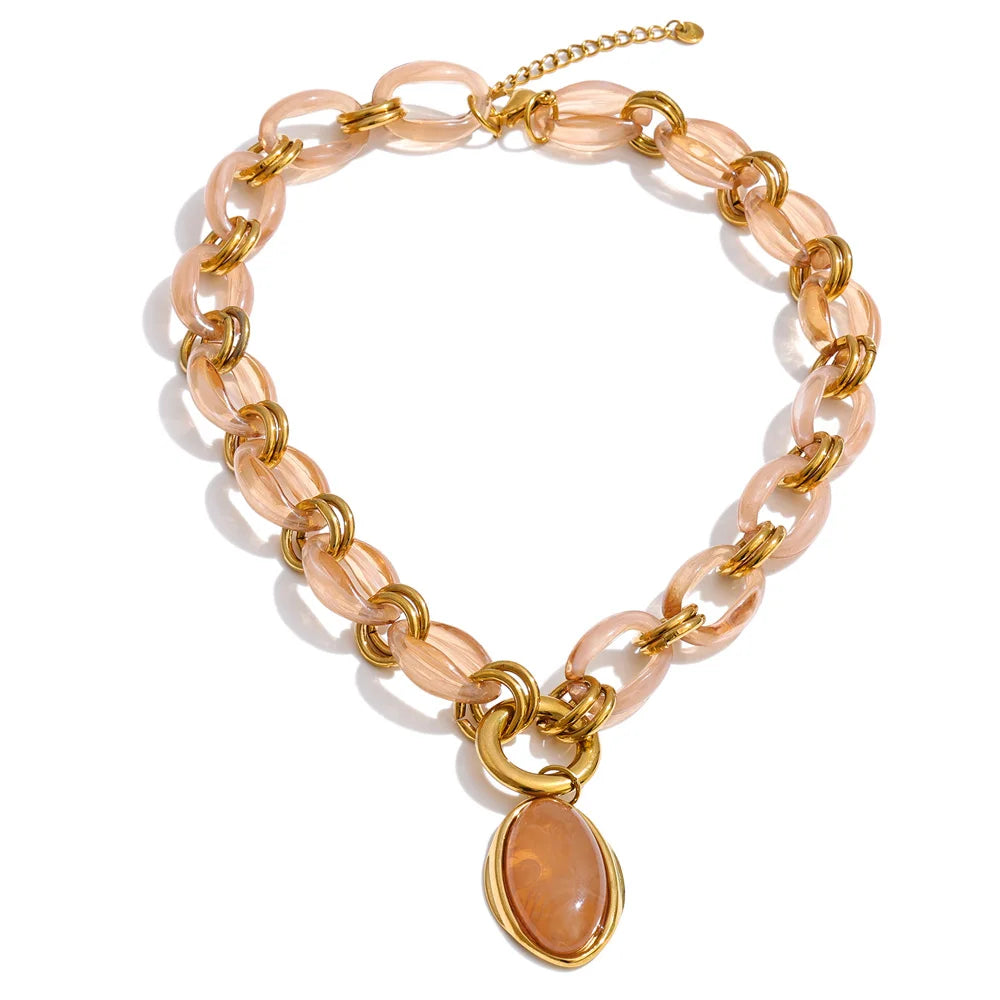 Resin acrylic geometric necklace in gold-plated stainless steel with resin and acrylic.