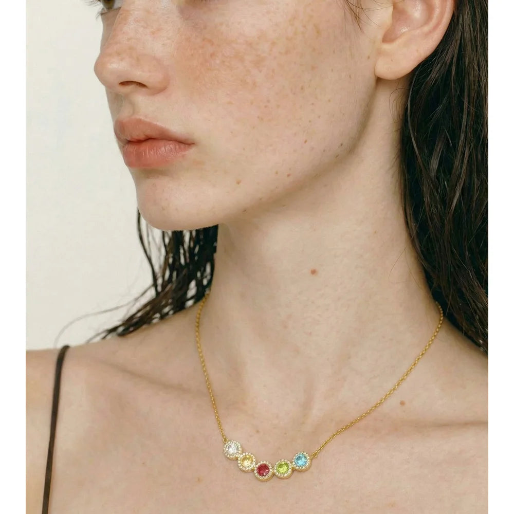 Cubic zirconia multi-color geometric necklace in gold-plated stainless steel with cubic zirconia.