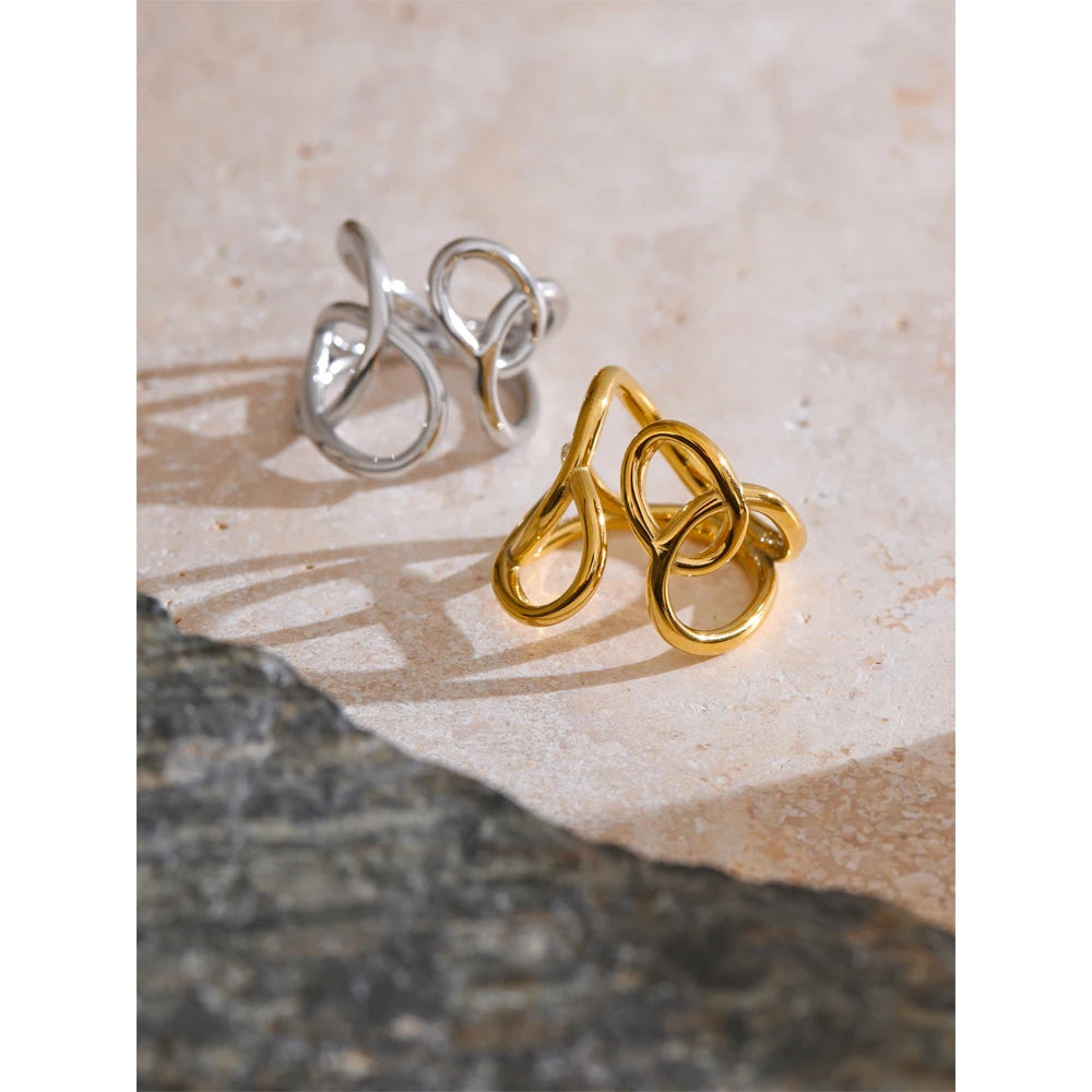 Geometric ring in gold-plated stainless steel.