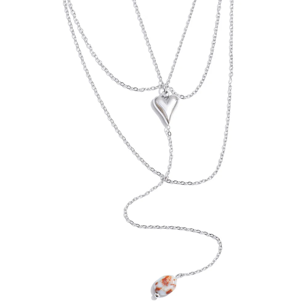 Natural stone heart chain necklace in gold-plated stainless steel with natural stone.