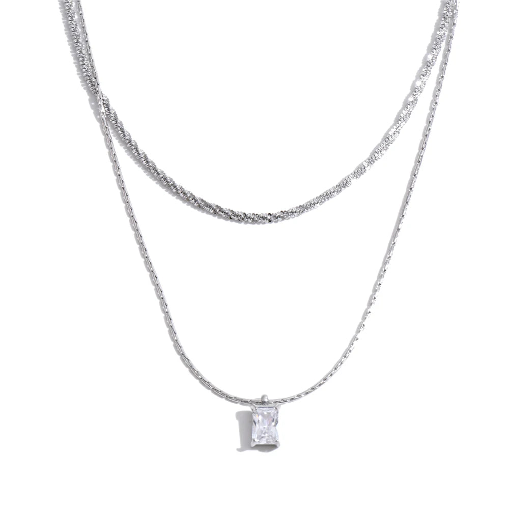 Cubic zirconia geometric chain necklace in gold-plated stainless steel with cubic zirconia.