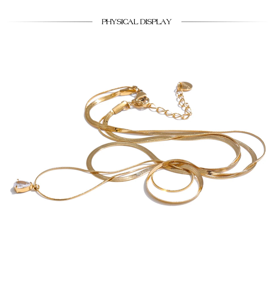 Cubic zirconia snake geometric necklace in gold-plated stainless steel with cubic zirconia.