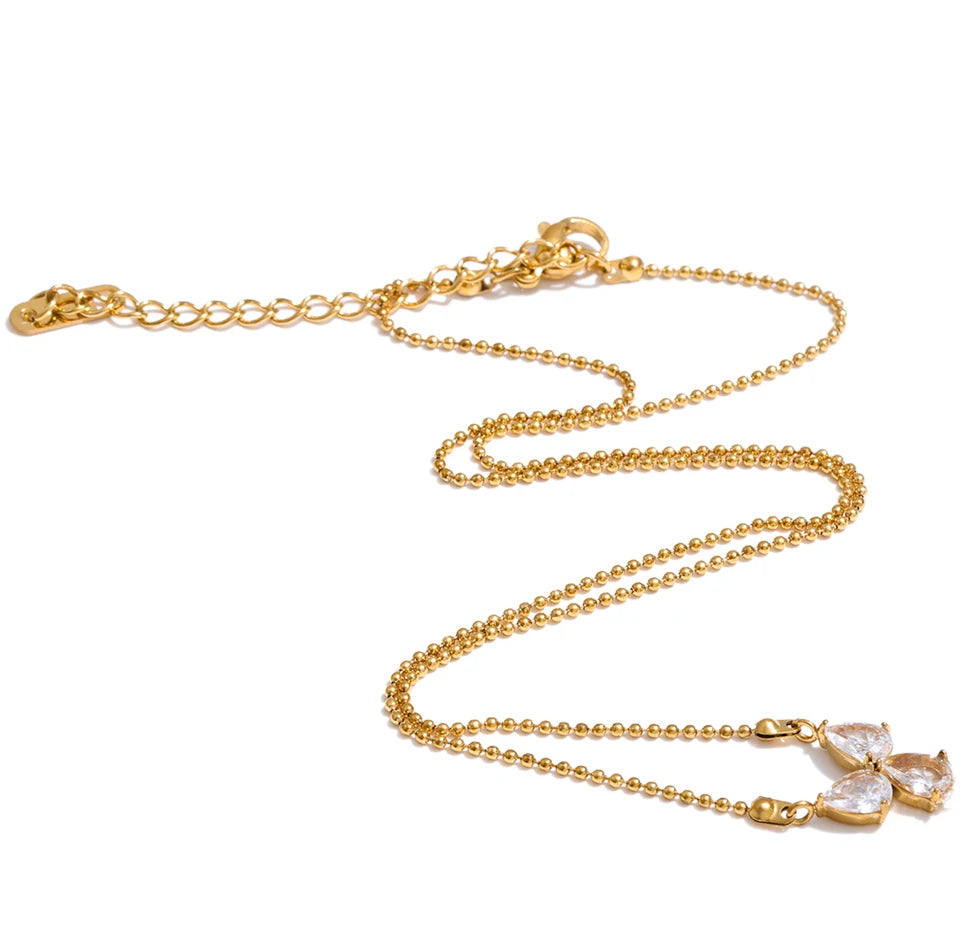 Cubic zirconia geometric necklace in gold-plated stainless steel with cubic zirconia.