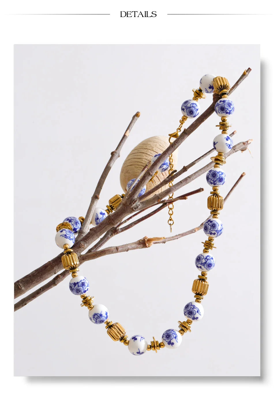 Blue flower beaded necklace in gold-plated stainless steel.